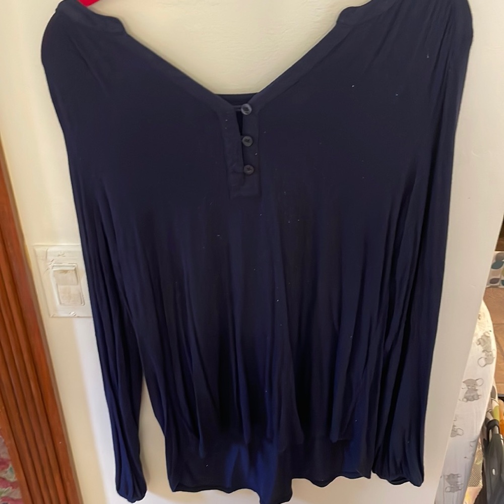 Navy top with some piling
